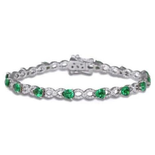 15 CT OVAL CUT GREEN EMERALD WITH DIAMONDS BRACELET